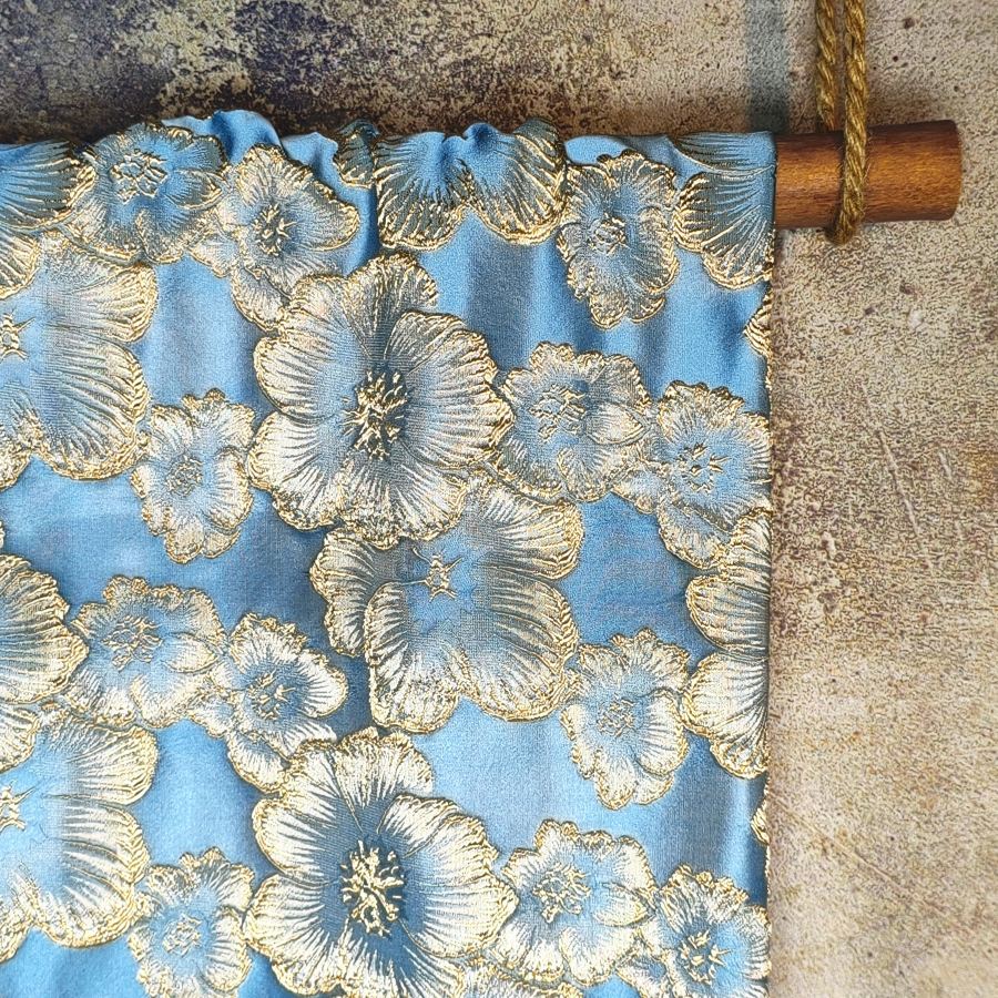 Light blue petal solid relief gold thread designer fabric