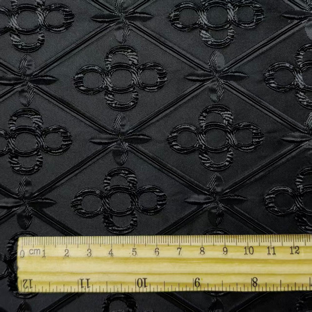Black geometric embossed heart lock texture fabric