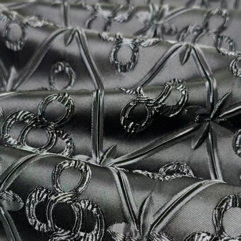 Black geometric embossed heart lock texture fabric