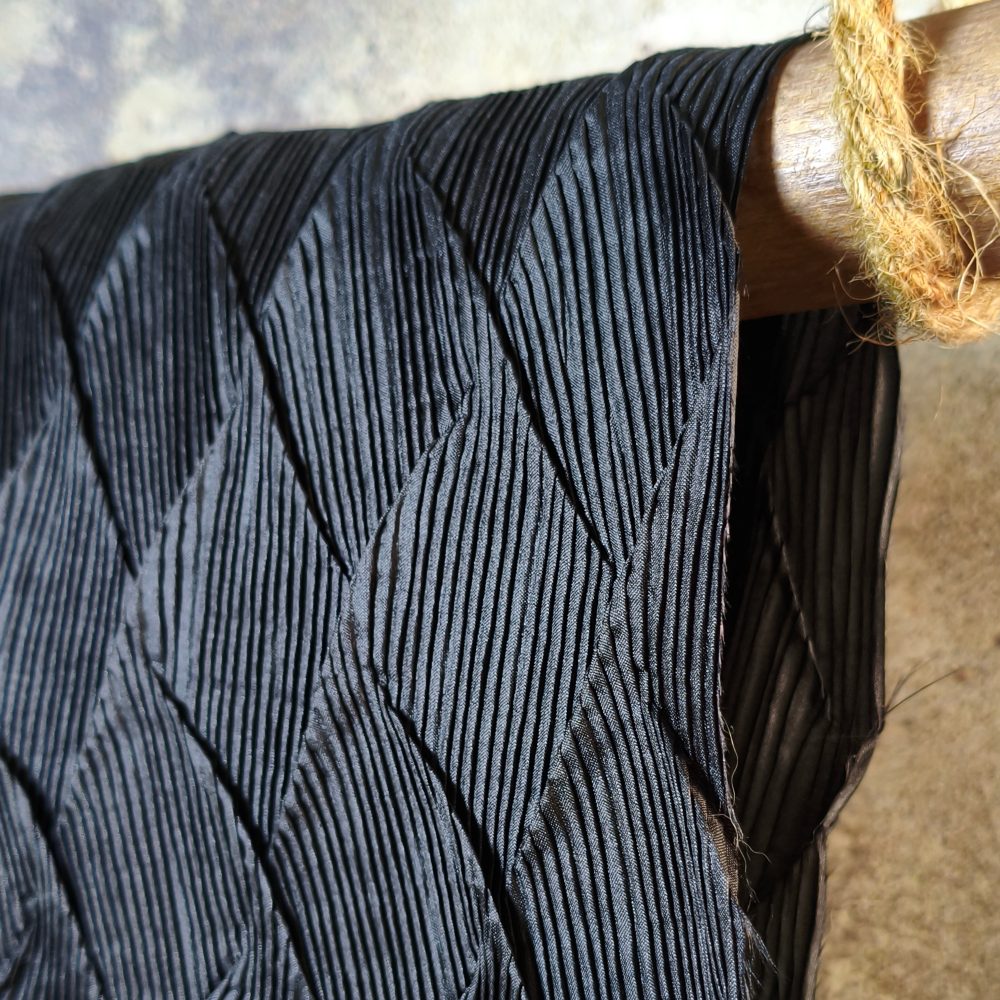 Black heavy-duty fabric with pleated texture reconstruction design