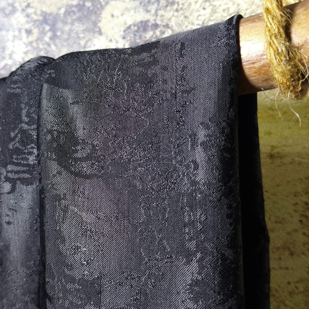 Black mottled textured jacquard artistic designer fabric
