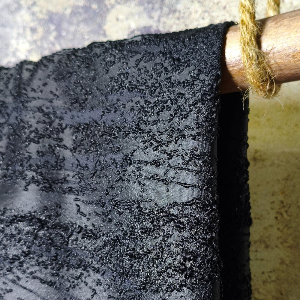 Black solid jacquard fabric