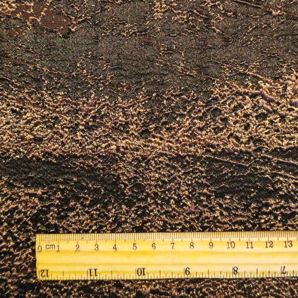 Colored heavy-duty designer fabric with golden thread luster and solid particles