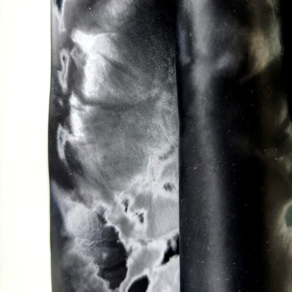 High-grade black fabric with metallic layered texture