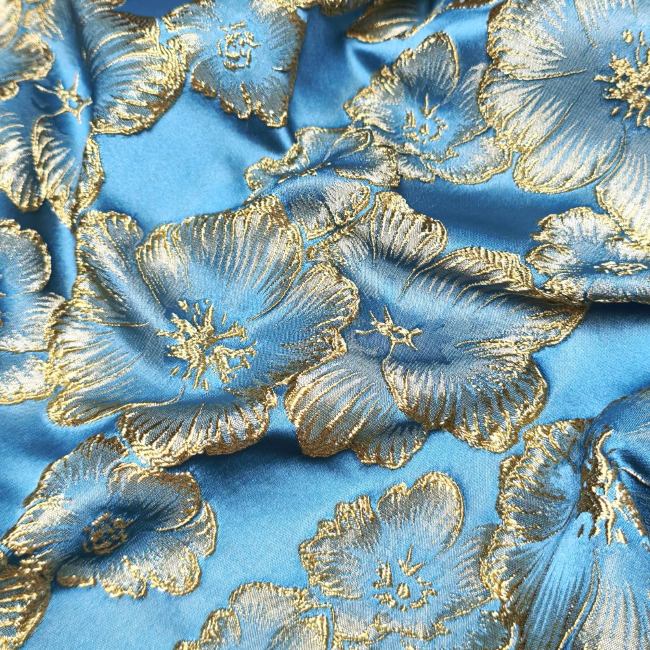 Light blue petal solid relief gold thread designer fabric