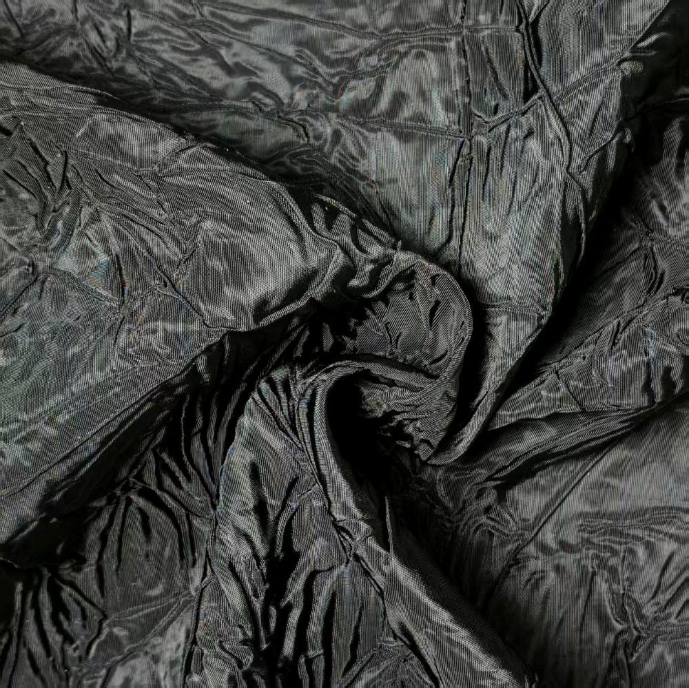 Black irregularly pleated texture embossed fabric