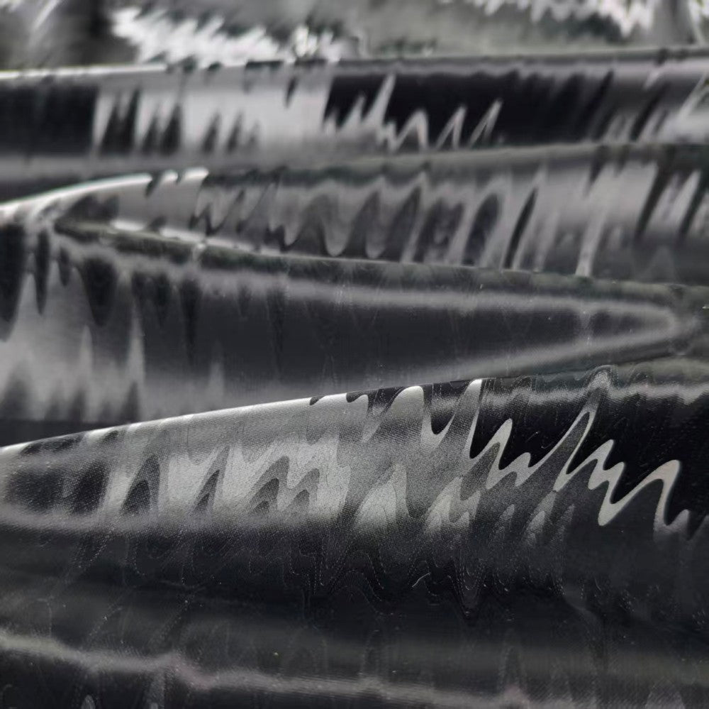 Black solid dynamic mountain embossing futuristic designer fabric