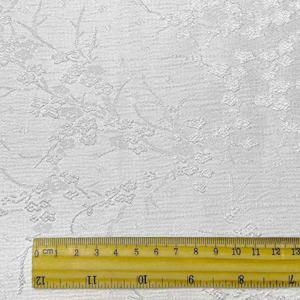White plum blossom pattern embossed non-stretch design fabric