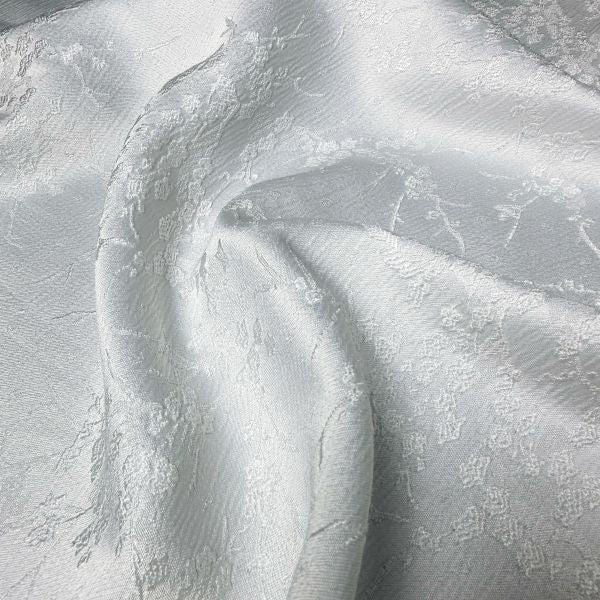 White plum blossom pattern embossed non-stretch design fabric