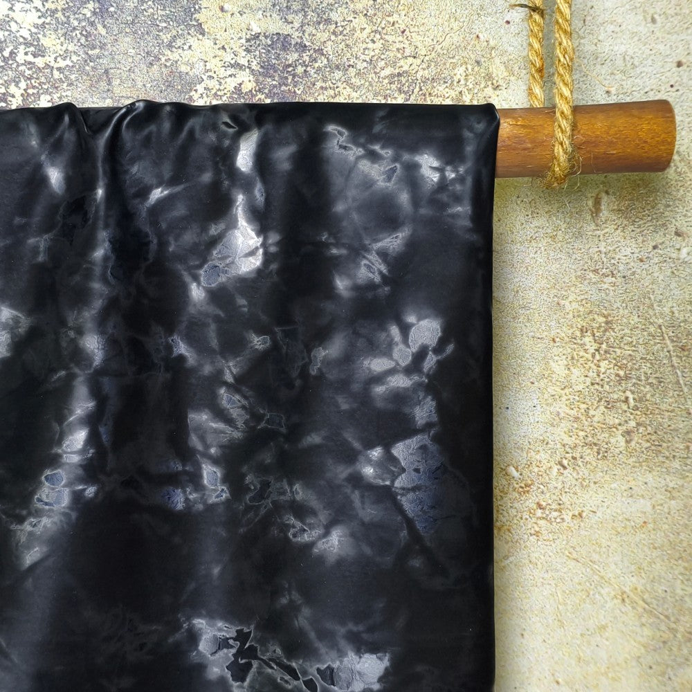 High-grade black fabric with metallic layered texture