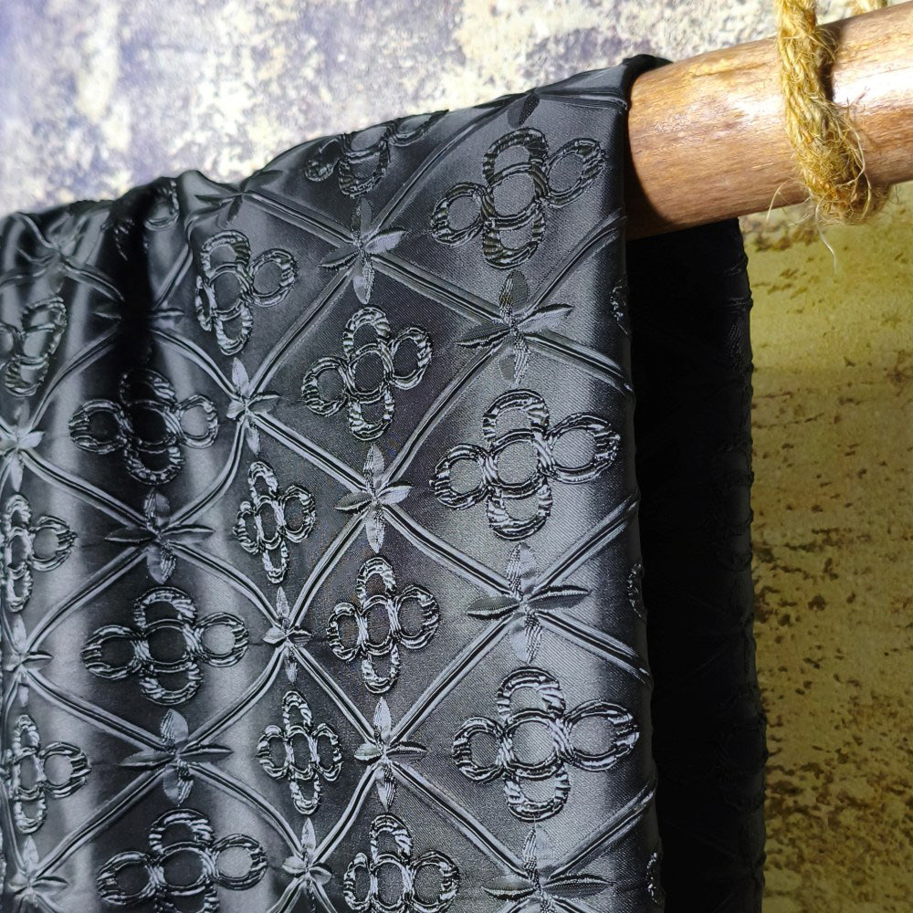 Black geometric embossed heart lock texture fabric