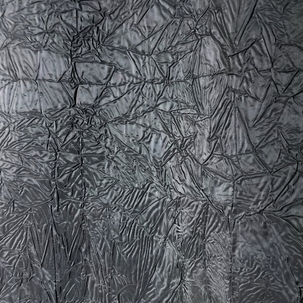 Black irregularly pleated texture embossed fabric